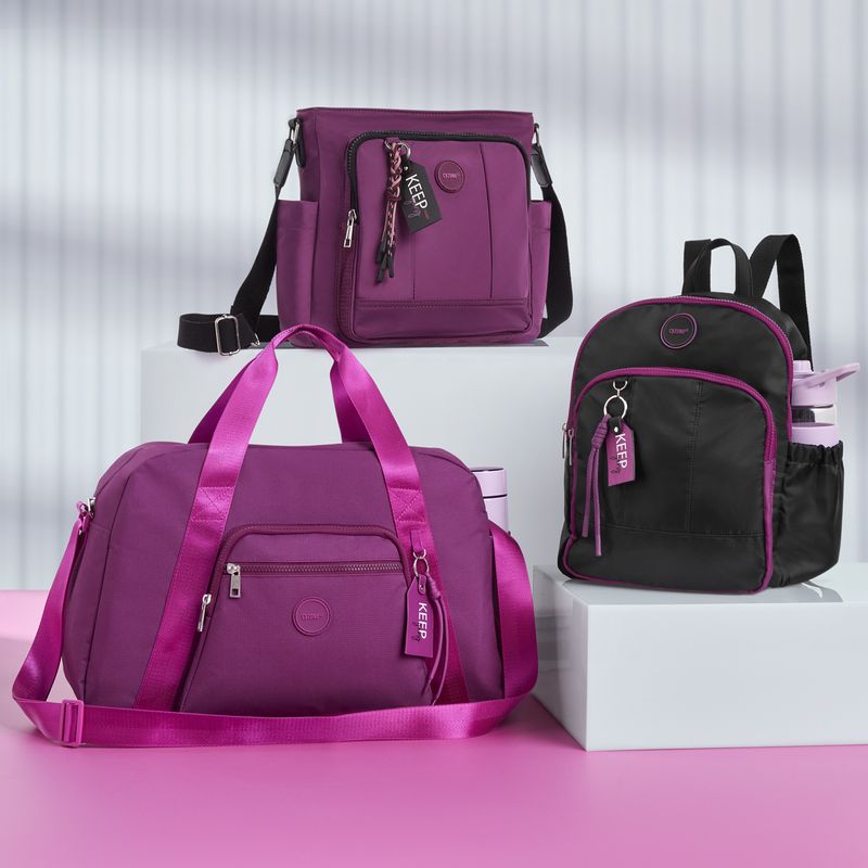 Maletin-para-mujer-de-estilo-casual-en-tela-poliester-de-color-morado-con-asa-larga-regulable.